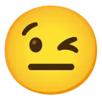 وجه يغمز + وجه بدون تعبير