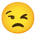 وجه يغمز + وجه غير مستمتع
