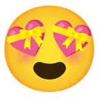 وجه مبتسم مع عينين على شكل قلب + قلب عليه شريط
