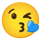وجه يرسل قبلة + قلب أزرق