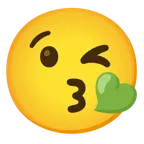 وجه يرسل قبلة + قلب أخضر