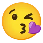 وجه يرسل قبلة + قلب أرجواني