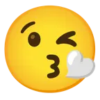 وجه يرسل قبلة + قلب أبيض