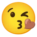 وجه يرسل قبلة + قلب بني