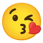 وجه يرسل قبلة + قلب أحمر