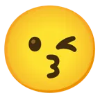 وجه يقبّل بعينين باسمتين + وجه يغمز