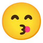 وجه يقبّل بعينين باسمتين + وجه بلسان متدلٍ