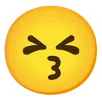 وجه يقبّل بعينين باسمتين + وجه جاد