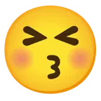 وجه يقبّل بعينين مغلقتين + وجه مرتبك