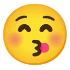 وجه يقبّل بعينين مغلقتين + وجه بلسان متدلٍ