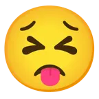 dil dışarıda + kararlı yüz
