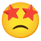 وجه بعينين على شكل نجمة + وجه عابس قليلاً