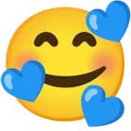 وجه مبتسم مع ثلاثة قلوب + قلب أزرق