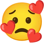 وجه مبتسم مع ثلاثة قلوب + وجه قلق