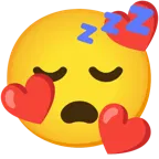 وجه مبتسم مع ثلاثة قلوب + وجه نائم