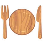 Holz + Teller mit Messer und Gabel