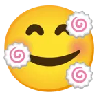 وجه مبتسم مع ثلاثة قلوب + كعكة سمك بشكل حلزوني