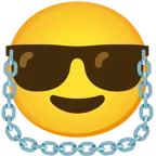 cara sonriendo con gafas de sol + cadenas