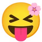 Kirschblüte + Gesicht mit herausgestreckter Zunge und zusammengekniffenen Augen