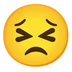 وجه مبتسم بعينين مغلقتين + وجه جاد