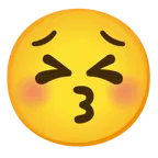 وجه يقبّل بعينين مغلقتين + وجه جاد