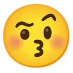 وجه يقبّل بعينين مغلقتين + وجه بحاجب مرفوع