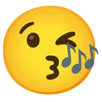 وجه يرسل قبلة + نوتات موسيقية
