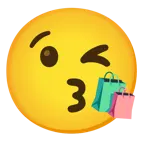 وجه يرسل قبلة + حقائب تسوق