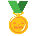 medaglia d’oro + zucca di Halloween