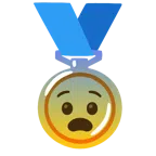 medaglia d’oro + faccina impaurita