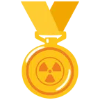 medaglia d’oro + simbolo della radioattività
