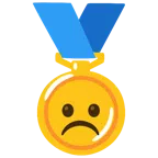 medaglia d’oro + faccina imbronciata