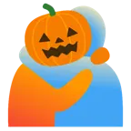 personas abrazándose + calabaza de Halloween
