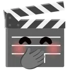 ciak + faccina con mano sulla bocca