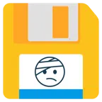 floppy disc + faccina con la testa bendata