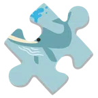 pezzo di puzzle + balena che spruzza acqua