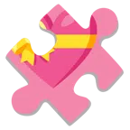pezzo di puzzle + cuore con fiocco