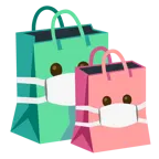 cara con mascarilla médica + bolsas de compras