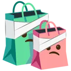 cara con la cabeza vendada + bolsas de compras