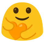 personas abrazándose + corazón naranja