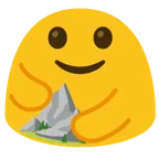 personas abrazándose + montaña